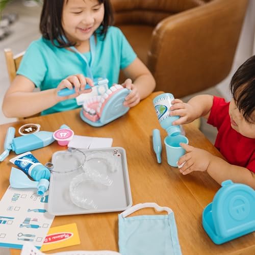 Set de joacă pentru dentist Melissa & Doug Super Smile cu accesorii realiste extinse, 26 piese, pentru copii de peste 3 ani. Optimizare SEO: Set de joacă pentru dentist cu accesorii realiste, 26 piese, potrivit pentru copii de peste 3 ani. - imagine 2